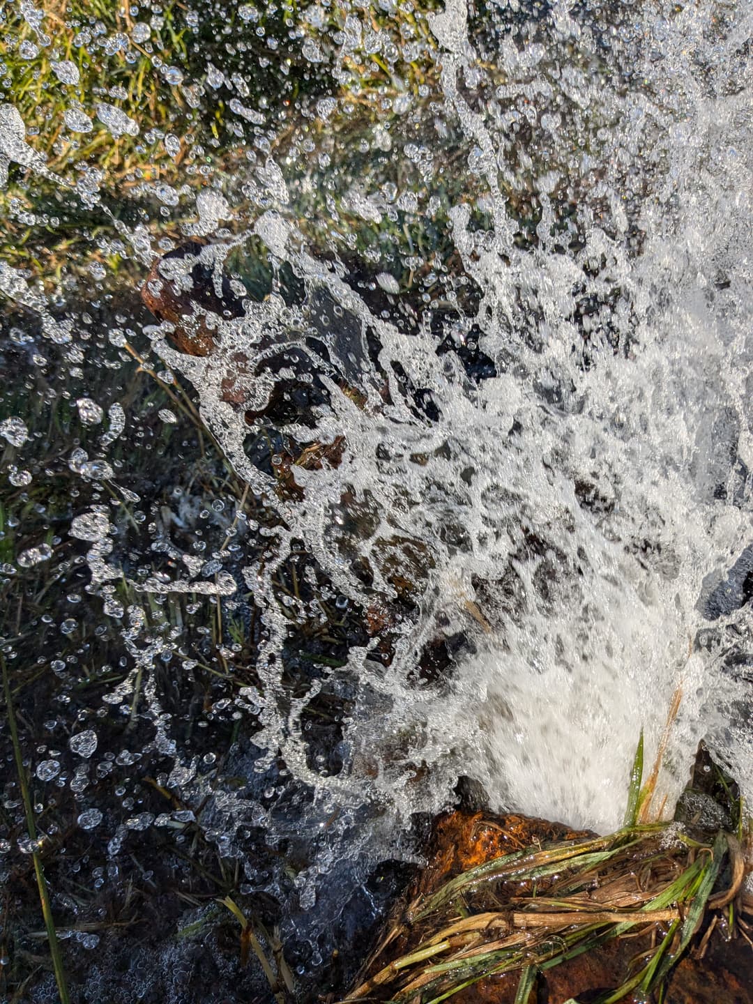 The burst drain valve spurting out water